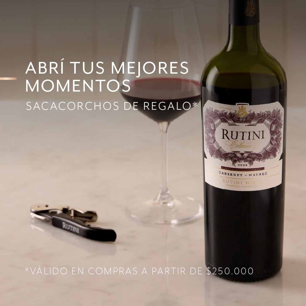 Botella de vino tinto Rutini, copa servida y sacacorchos de regalo sobre fondo claro con el texto 'Abrí tus mejores momentos'